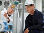 Customer with Endress+Hauser engineer in a plant.